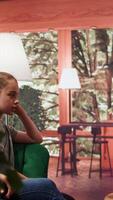 Therapist taking notes of the mental health progress with an adolescent in counseling, keeping track of her intrusive thoughts. Psychologist helping with social anxiety. Camera B. video