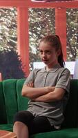 Adolescent girl in therapy discussing behavioral issues and personal challenges. Counseling session with psychologist to help with intrusive thoughts, improve overall emotional wellbeing. Camera B. video