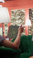 Adolescent girl in counseling discussing behavioral issues and personal challenges. Therapy session with psychologist to help with intrusive thoughts, improve overall emotional wellbeing. Camera B. video
