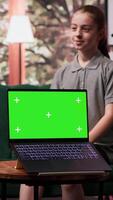 Therapist uses green screen display in a counseling session with an adolescent dealing with low confidence. Psychotherapist supports her in building resilience and self esteem. Camera A. video