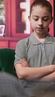 Adolescent undergoing behavioral therapy to address anxiety and social issues. Session with an expert focuses on emotional management while addressing cyberbullying. Troubled teen. Camera A. video