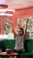 Adolescent undergoing behavioral therapy to address anxiety and social issues. Session with an expert focuses on emotional management while addressing cyberbullying. Troubled teen. Camera B. video