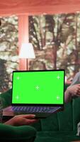 Therapist uses green screen display in a counseling session with an adolescent dealing with low confidence. Psychotherapist supports her in building resilience and self esteem. Camera B. video