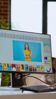 Vertical Freelance designer works on a photo editing project in a remote office, using advanced design software. Home workspace promotes creativity and innovation for online work. Camera B. video