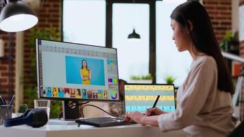 Freelance designer works on a photo editing project in a remote office, using advanced design software. Home workspace promotes creativity and innovation for online work. Camera B. video
