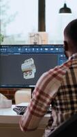 Vertical Engineer designs a turbine in an industrial office using CAD software. Working from home with dual monitors and tools for 3D rendering, boosting productivity and technical precision. Camera B. video