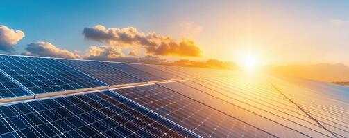 Solar panels reflecting sunlight during sunrise, showcasing sustainable energy production with a beautiful sky for renewable resources and clean technology. photo