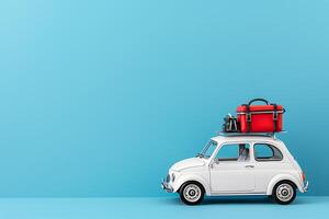 White Vintage Car with Red Luggage on Roof Against Blue Backdrop, Travel Adventure and Wanderlust with Copy Space photo