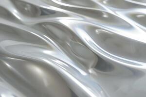 The image is a silver surface with a wavy texture photo