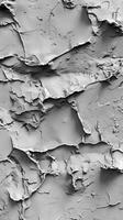 The image is a close up of a wall with a lot of cracks and peeling paint photo