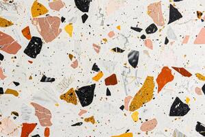 Mosaic tile floor with colorful stones. Geometric flooring design concept. photo