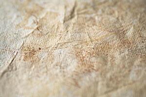 Black pencils and textured paper. Simple stationery background. photo
