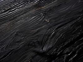 Grainy textured black wooden surface. Dark wood background concept. photo