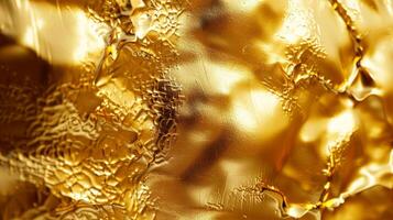Gold fabric with a wave pattern. Abstract material background concept. photo