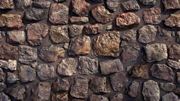 A wall made of large rocks with a rough texture photo