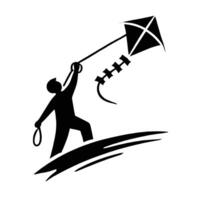A man flying a kite on a hill vector