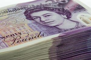 A stack of british pound notes photo