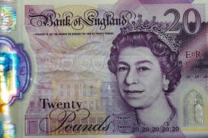 A twenty pound note with a portrait of queen elizabeth on it photo