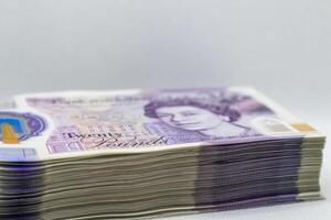 A stack of british pound notes photo