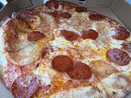 Delicious Pepperoni Pizza in a Box photo