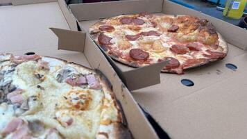 Two Delicious Pizzas in a Box photo
