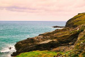 Scenic Coastal View with Rocky Cliffs in Tintagel, Cornwall, UK photo
