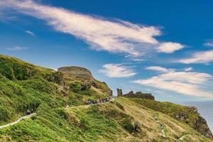 Scenic Hillside Path with Ancient Ruins in Tintagel, Cornwall, UK photo