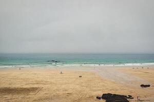 Serene Overcast Beach Scene in St Ives, Cornwall, UK photo