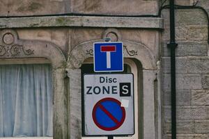 Street Sign Indicating T-Junction and Parking Zone S photo