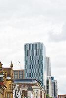 Modern Skyscraper in Urban Landscape in Leeds, UK photo