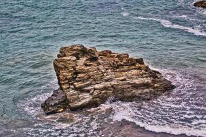 Rugged Rock Formation in Tintagel, Cornwall, UK photo