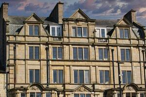 Historic Stone Building Facade with Dramatic Sky in Harrogate, UK photo