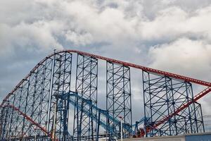 Towering Roller Coaster Against Cloudy Sky in Blackpool, UK photo