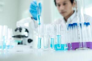 Scientist analyze biochemical sample in advanced scientific laboratory. Medical professional check chemical mix microbiological developmental of viral. Biotechnology research in science lab. cosmetic photo