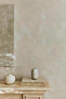 Minimalistic monochromatic composition with design vases and personal accessories. Poster on the wall. Copy space. Neutral colors. Template. photo