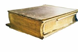 a very old book in Arabic on a white background. photo