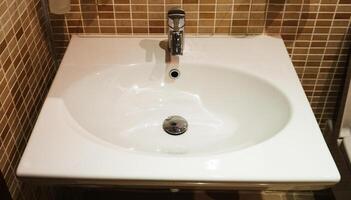 Interior of bathroom with sink basin,Modern bathroom in luxury house,Modern wash basin in the bathroom photo