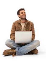 A man is sitting cross-legged on floor with a laptop on his lap , he is looking happy. isolate on transparency background png