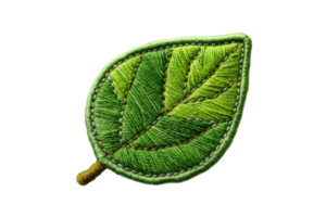 High-quality embroidered green leaf patch with intricate detailing, ideal for clothing, accessories, and crafts. Nature-inspired decorative element. png