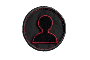 Circular badge on black background with a red outline person icon, perfect for themes of identity, recognition, or organization. png