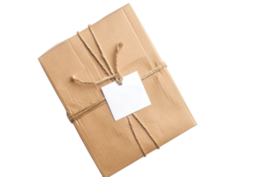 Simple eco-friendly brown paper package tied with string and blank white label perfect for gift presentations or deliveries. png
