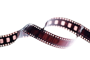 Close-up of a vintage film strip with a transparent background. evoking nostalgia and the art of traditional photography and filmmaking. png