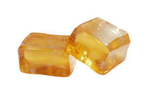 Close-up of two translucent amber resin pieces against a transparent background. showcasing their natural texture and color. png