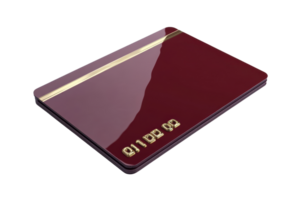 Close-up of a maroon credit card with golden print on a transparent background. focused on elegant design and detail. png