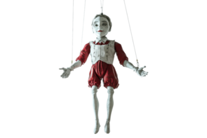 Vintage puppet with red clothes and strings, hanging on display, isolated on transparent background. classic marionette for theater and decor. png