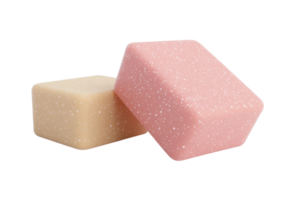 Two rectangular soap bars, one pink and one beige, with a dotted texture, isolated on a transparent background. png