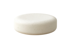 Minimalist photo of a white, round bar of soap with tiny exfoliating specks, isolated on a transparent background. perfect for hygiene products. png