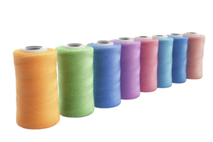 Colorful spools of sewing thread lined up in a row. Ideal for crafting, sewing, and textile projects. Vibrant and diverse colors. png