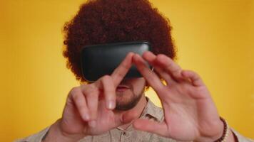 Man using virtual reality headset helmet app to play simulation innovation 3D game in VR goggles video