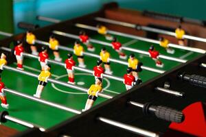 Close Up of a Foosball Table With Foosball Players photo